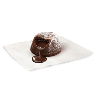 Delicioso bizcocho de Chocolate relleno de chocolate fundido. Imagen vulcano de chocolate